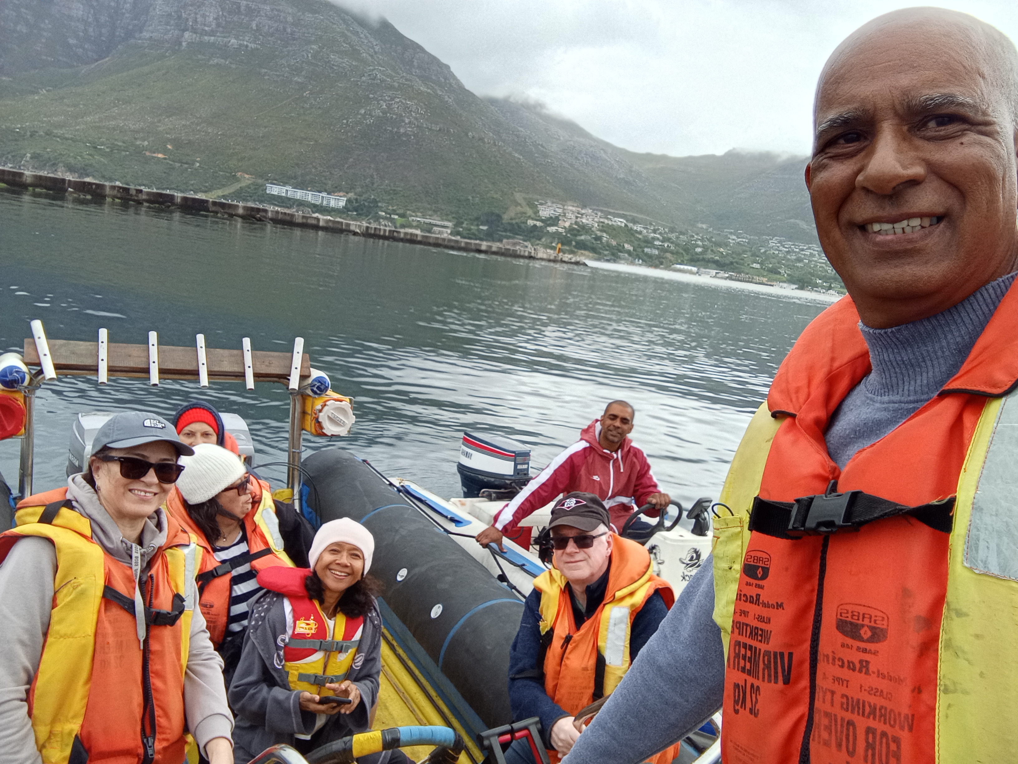 Happy guests smiling on our leisure boat trip in Cape Town